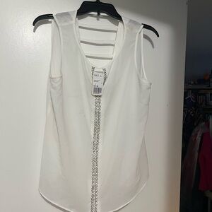 White Sleeveless V-Neck Top with Ladder Back Detail